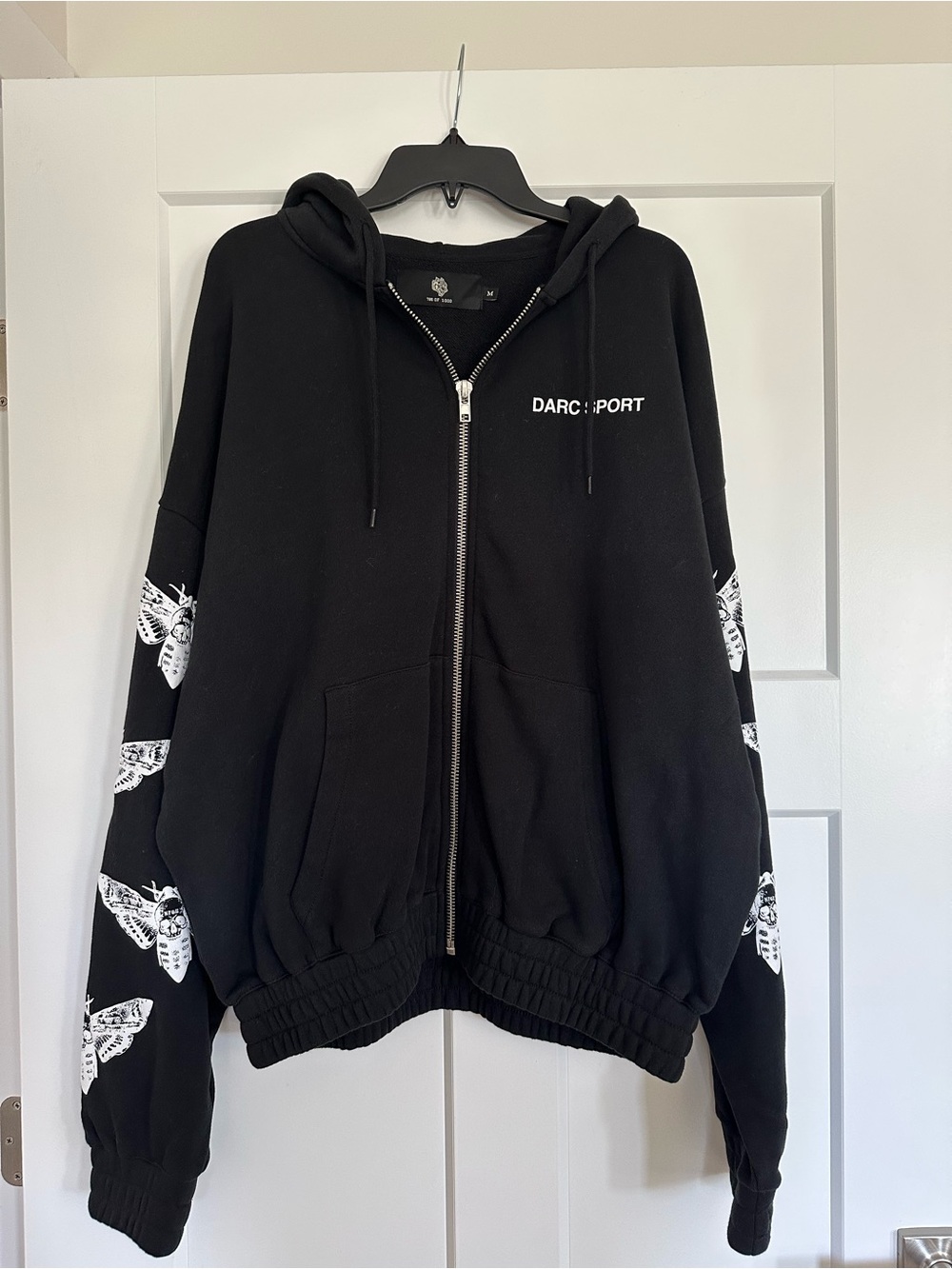 Darc Sport Black Zip-Up Hoodie with White Moth Sleeve Prints